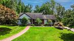 One of a kind Custom Cape Cod style home, expanded and updated, lovingly maintained and cared for the past 50+ years by the same family. Numerous additions include a Breakfast/Dining Room off the Kitchen, a Great Room off the Living Room (with a 2 sided fireplace in between, one stone and one marble) and a secondary Cathedral Ceiling with Skylights Family Room/Sunroom off the Great Room - ALL which makes this a great home for family gatherings and entertaining. All 5 bedrooms include generous sized walk in closets. Both Full Baths appointed in granite and marble and have whirlpool tubs. Numerous built ins throughout. All granite, marble and hardwood flooring. Finished Basement with great recreation space with wet bar. New boiler, all updated plumbing. ALL set on privacy seekers near 1.25 Acres of flat manicured property with Gazebo, multi decking and paver driveway. Close to shopping, transportation and main roads, the location is ideal. It&rsquo;s a golden opportunity.