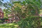 Traditional Brick home on a tree lined street in Forest Hills Gardens. Enjoy gatherings in the grand living room by the cozy fireplace. This charming 4-bedroom, 2-bathroom offers ample space for all. Enjoy living in the neighborhood of Forest Hills Gardens. Proximity to shops, restaurants, and transportation.