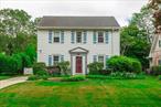 Welcome to 512 Manatuck Boulevard â€” a beautifully maintained and updated 3-bedroom, 2.5-bath Colonial nestled in the desirable Village of Brightwaters. Situated on a 7, 405 sq ft lot, this 1929 home offers timeless charm with across 2, 210 sq ft of living space.Step inside to an inviting entrance foyer leading to a formal dining room, spacious living room with wood-burning fireplace, and a large eat-in kitchen featuring white appliances including a gas range, microwave, dishwasher, and refrigerator. The first floor also offers a laundry area, half bath, and access to a private backyard deck â€” perfect for entertaining.Upstairs, the second level includes a generous primary suite with full bath, two additional bedrooms, and another full bath. Original details are blended with thoughtful updates throughout, including hardwood floors (under all of the carpeting), attic fan, and washer/dryer hookup. Enjoy outdoor living in the fully fenced backyard with mature landscaping, gardens, and front/rear sprinkler systems. The private driveway and 2 car garage provides ample parking.Updates Include: New 150 amp electric panel 2014, Roof 2013, Roof De-Icer 2011, Windows 2014, Boiler 2019, Hot Water Heater 2018, In-Ground Sprinklers 2018, Chimney Liner 2019 (10 year guarantee, transferable to new owner)Close proximity to vibrant Bay Shore downtown offering shopping and restaruants. Within walking distance to the 4 Corners Brightwaters village restaurants and village amenities including 2 parks, Walker Beach, tennis,  in the Grand Concourse, snow removal and code enforcement. Taxes INCLUDE both Village and Town of Islip with NO exemptions.