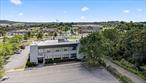 Discover this well-maintained 24/7 full-access Class B commercial building, perfectly blending functional lab space with modern executive offices.? The main floor is primarily dedicated to lab space, including a critical clean room.? Adjacent to the clean room, you&rsquo;ll find an unfinished/industrial-style area with open ceilings, ideal for specialized operations, complemented by a convenient small loading dock.?Upstairs, the executive office space provides a professional environment.? The full finished basement adds significant utility with a break room, multiple offices, and a hallway with lockers, offering ample support and storage.?Offered on a Triple Net lease basis, tenant pays rent and all operating expenses.? Listing may not itemize all operating expenses.?