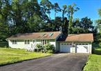 Upgraded one level living ranch in wonderful location, close to Route 9 and all amenities. This home has been freshly painted, new carpeting installed, new doors, new bathrooms and is ready for its next owner. Perfect for first time home buyer or anyone downsizing.Large Country kitchen with sizeable eating area and sliding glass doors to large deck overlooking large level backyard, walk into the large living room with gleaming floors, picture window, skylights, ceiling fan and own CA/HEAT unit. Master Bedroom with updated 1/2 bath and two additional guest rooms with updated hallway full bath. Owner installed mini splits units for heat and ac, so no worries in the summer heat. Great established neighborhood, over 1/2 acre of leveled land, 2 car garage.Come and take a tour of this lovely home priced to sell!