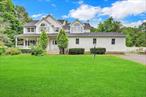 Extra Large, newer colonial style home with full basement, 2-Car Detached garage, accessory area, having hardwood flooring, Eat-In-Kitchen, Den with fireplace, spacious rooms, and grand appearance. This amazing location provides ease of access to stores, businesses, eateries, schools, and other area amenities.