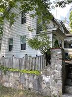 Here is your chance to restore this home on a quiet dead end block. The house features first floor living and dining room, kitchen as well as 1/2 bathroom. Upstairs you will find plenty of space to spread out in the bedrooms and ample closet space. Around the side a 2nd apartment as well with more updated finishes. Excellent location and priced so that you customize and restore this property.