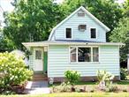 Anchored in the vibrant heart of the Catskills Park, this traditional 1800s village home blends timeless character with thoughtful modern updates. Offering 2 bedrooms, 1.5 baths, and 1, 324 sq ft of all-season comfort, the property features a well-tended backyard garden which is an oasis with perennials, mature shade trees and an inviting post-and-beam screened back porch perfect for seasonal lounging. Interior enhancements include fresh paint, refreshed kitchen cabinetry, updated vinyl plank flooring, and a propane-fueled wood stove backed by a propane supplierâ€™s service agreement. Recent improvements span a 2020 roof replacement and newer appliances, including refrigerator, washer, and dryer.Located in the walkable heart of Phoeniciaâ€”where local dining, boutique shops, the Phoenicia Playhouse Community Theatre and the NYC Trailways bus stop meetâ€”this home also offers easy access to Belleayre Mountain Ski Center, Belleayre Lake beach, and miles of Catskills hiking trails. Just a short drive away are the cultural gems of Woodstock, the outdoor adventures of Hunter, and other charming mountain towns. Whether you are drawn to crisp autumn hikes, snowy slopes, blooming gardens, or laid-back summer weekends, 18 Tremper Ave is your gateway to a richly textured Catskills lifestyle.