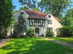Leave the city without leaving the city! This stately Pelham Heights home is located one block from the Pelham Train Station with regular, 35-minute service to mid-town. Large rooms throughout, including spacious living room with fireplace and adjoining sunroom, formal dining room and eat-in kitchen. The four second floor bedrooms are all generously-sized, including master bedroom with en suite bath, dressing room, and adjoining office/nursery. Third floor with two bedrooms and full bath. Finished basement. Level yard overlooked by a fabulous deck. Two blocks from elementary school, three blocks to middle and high schools and an easy walk to town grocery store, restaurants, shops and the Pelham Picture House. This property offers the best location and value for a single-family home in the charming Town of Pelham.