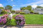 Charming Oakdale Ranch South of Montauk â€“ Quiet Elegance Near the WaterTucked away on a peaceful dead-end street just steps from the water, this beautifully updated ranch offers the perfect blend of coastal living and modern comfort. Located in one of Oakdaleâ€™s most desirable south-of-Montauk neighborhoods, youâ€™ll love being close to marinas, local restaurants, and the yacht club.Inside, enjoy rich hardwood floors recently stained to perfection, an updated kitchen with granite countertops, custom cabinetry, and stainless steel appliances. The cozy den off the kitchen features a gas fireplace and the sunroom offers a bright, relaxing space to unwind year-round.The primary bedroom includes a full en-suite bath, and central air ensures comfort throughout. Outside, the lavishly landscaped yard bursts with vibrant flowers, paver walkways, and private space to relax or entertain.Flood insurance is transferable to the new owners for just $1, 356/year. A truly special opportunity in a beautiful locationâ€”donâ€™t miss it!