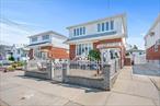 ***Amazing 2 family in Long Howard Beach, Fantastic water view, Steps to Charles Park, Viewing the gorgeous Jamaica Bay, North Channel Bridge, Cross Bay Veterans Memorial Bridge, and Cross Bay Blvd. A lot of 40X100 with fence, separate entrance for each family. Big back and lovely front yard. 1st floor: There are 3 large bedrooms, spacious living room and dining area, Eik. with window, 1 full bath: On the 2nd floor: Fully renovated with top line materials, granite floors and countertops, Featuring the open floor plan of spacious living room dining area, open updated kit. with a big island. one big Updated Eik. 2 big bedrooms, 1 new bath, laundry room. Basement is finished with a huge family room, laundry room, boiler room. 2 meters of Gas and electricity. Maintained well with care and love. Excellent condition. A great opportunity of living with the family or investment in such a quiet, comfortable and convenient community with Bus Q11 in front of the house . Close to A Train, like a shining star in the sky of South Queens. Seeing is believing.