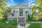 Discover this 4-bedroom, 1.5-bath home,  situated in Mastic Beach. This residence offers the idyllic feel of a beach home, within walking distance to local beaches and parks, yet far enough away to provide comfort, privacy and safety during inclement weather. Move in condition throughout, the home welcomes you with a walk-up front porch, spacious enough for relaxing with chairs or tables, creating a spacious entry. Interiors and Design-Step inside to a large living room area featuring high ceilings and abundant natural sunlight streaming in through generous windows. The wood flooring, and it&rsquo;s cable-ready for your convenience.The first floor also includes a convenient half bathroom and a stunning eat-in kitchen, which boasts all-new appliances and cabinets, sparkling granite countertops, and plenty of sunlight from its many windows. The kitchen is finished with attractive tile flooring. On the main floor are two nicely sized bedrooms, both with ample closet space and wood floors. A full bathroom on this level offers a bathtub, a brand-new sink/vanity with stone countertops, a built-in washer and dryer, and heated towel racks with temperature adjustment for ultimate comfort.Outdoor Oasis and Privacy: The kitchen, located at the far end of the home, provides a second entrance leading to the fenced-in backyard. This private retreat features a fire pit, perfect for any kind of outdoor enjoyment. You&rsquo;ll also find plants and flowers that enhance the home&rsquo;s character, along with well-kept landscaping. A large shed offers ample storage for outdoor equipment, bicycles, and more, complete with shelving for various needs.Spacious Second Floor RetreatA , vaulted stairway off the kitchen, illuminated by a striking chandelier, leads you to the second floor, hinting at the spaciousness to come. Here, you&rsquo;ll find two massive bedrooms, both with high ceilings. These rooms are designed almost like a Jack and Jill setup but separated for privacy, each boasting two very large closets. The open feel of these rooms allows for various setup options, with matching designs that include a cut-out space perfect for reading nooks or quarter-style bed areas. The second floor is carpeted for comfort and offers endless possibilities for use of space. One of these generously sized rooms uniquely features a high built-in space ideal for storage or even a small daybed. Throughout the second floor, the generous size and number of windows ensure an abundance of sunlight all day long.Exterior Features and Convenient Location:The exterior of this home boasts a brand new roof with a warranty. Enjoy the generous amount of open space on all sides of the house. A double-gated fence to the right of the property leads directly into the backyard, providing convenient access and parking space for 6-8 cars as desired. Situated on a corner lot, the home benefits from protected lands on the opposite side of the front, ensuring privacy and an unobstructed view from your front porch. High shrubbery at the front of the home also contributes to the sense of privacy.Utilities and Accessibility:This home is cable-ready and features separate digital climate controls on both floors for personalized comfort. It utilizes oil utility with an outdoor tank, ensuring the integrity of the home should any issues arise with the tank, preventing interior impact. The utility area features a smartly hidden exterior/interior built-in section with a door for convenient access. Mastic Beach Living:Located just minutes away from local beaches and stores, you&rsquo;ll also find a main street with shops for all your needs. Commuting is a breeze, as the home is just minutes away from parkways, highways, and trains for easy travel by car or public transportation. Families will appreciate the proximity to public schools with transportation provided for children attending schools in the area.