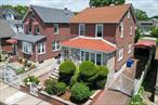 Beautiful solid brick 4 Bedroom Colonial in prestigious Flushing North neighborhood. Expertly maintained backyard with lush garden and quality masonry, great for entertainment. Granite floors throughout.  Recently renovated granite designer kitchen & baths. Excellent school district. Close to PS 21 and JHS 185. Walking distance to LIRR and bus stops 16, 15 and 15A. Near Bowne Park and Flushing Fields Close to shops & supermarket along Northern Blvd. Convenient to all.