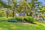 Beautifully maintained 2-bedroom one-level lower end unit with a Garage ideally located in the sought-after Holly Stream development. This move-in ready home offers a spacious and inviting living room featuring a wood-burning fireplace and French doors that open to a private patio overlooking a serene wooded area, perfect for relaxing or entertaining, the patio also provides direct access to the community pool, playground and clubhouse. Enjoy cooking in the updated, sun-filled eat-in kitchen complete with stainless steel appliances, granite countertops, tile floors and ample cabinet space. The primary bedroom boasts generous closet storage with direct access to the beautiful bright updated full bath, an adjacent good size second bedroom and a conveniently located laundry area completes this unit. Residents of Holly Stream enjoy a range of amenities including an in-ground swimming pool, playground, and clubhouse available to rent for special occasions, all set in a peaceful well-maintained neighborhood. Donâ€™t miss this opportunity to own a charming home in a fantastic community with easy access to local conveniences and commuter routes. Metro-North Croton Falls and Brewster train stations just minutes away, plus easy access to both I-84 and I-684. Salinger&rsquo;s Orchard is just up the road for seasonal apple picking and year round farm goods, this location combines commuter convenience with local amenities. Welcome Home!