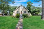 Welcome 61 High Hill Rd., Sound Beach. Spacious 2 Bedroom, 2 Bath , full of charmâ€”this ranch is a hidden gem!Step inside to find hardwood floors throughout the main level, a tiled eat-in kitchen, and a full finished basement with a private outside entranceâ€”redone just 6 months ago! Whether you need extra living space, a guest suite, or a home office, this setup has you covered.Enjoy peace of mind with a new gas hot water heater, updated fuse box, and newer gutters (only 4 years old). Thereâ€™s also a large attic with pull-down stairs and an oversized detached garage with soaring vaulted ceilingsâ€”perfect for storage, hobbies, or future possibilities.Set on a large, level property with room to expand. Conveniently located near shopping, main roads, restaurants, and of course, town beaches!
