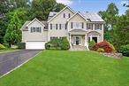 Located within the renowned Waterview Estates in Ossining, this house and property is simply STUNNING! Starting outside, the curb appeal of 32 Waterview is immediately on display. This classic Colonial with a rocking chair front entry porch, the handsome circular stone wall with a Japanese Maple as its centerpiece, and double wide driveway to comfortably accommodate residents&rsquo; and guests&rsquo; vehicles make for a warm welcome. In the back, a large Trex deck with two entries into the house encourages both relaxing AND entertaining guests, and the steps down to a great patio that can be used for a play area, firepit spot, and more. The outside is made complete with the expansive, completely fenced in backyard, amazing play set, and two gates from the fence leading to the nearby trails that run through the municipal-owned, non buildable land beyond the property. And the landscaping - Hydrangeas, boxwoods, and other custom plantings make the entire outside area an oasis! For even MORE enjoyment in the great outdoors, The Teatown Reservation entrance is less than three miles away, and Gerlach Park is a half mile away. Inside the house, you will notice the open floor plan right away. Refinished hardwood floors throughout the main level flow from room to room for comfort and convenience, and finishing touches abound, including crown molding, stunning chandeliers, beautiful window appointments, and a gas fireplace in the family room. The eat in kitchen with large breakfast nook is truly a chef&rsquo;s kitchen, with GE Profile and Monogram appliances including a beverage refrigerator and induction stove top, a huge double door pantry and more. The second level features four bedrooms, all with plush, wall to wall carpeting. The primary bedroom includes TWO walk in closets, a sitting area (that could even be an office), and the ensuite, custom bath with double sink vanity, Jacuzzi tub, and large glass enclosed shower. All of the other three bedrooms smartly include double closets with their own lights accessed from switches in the bedrooms. Separate from the four bedrooms, with its own entry and staircase off of the kitchen, is the Bonus Room! So much flexibility here, it can be for guests, or used as a playroom, office, home gym - SO many options. Finally, all the way down the basement is a TRULY expansive, finishable space with high ceilings and a walkout, sliding glass door to the side yard. This amazing house and property is frankly an absolute MUST-SEE if you are looking for one of the most stunning homes in Ossining! Taxes with $1659 STAR discount would be $26, 796.
