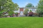 Final and best 7/28 Monday at 3:00. Location, Location! This impeccably maintained Raised Ranch shows pride of ownership and is located in Stonegate on park like acre near the end of a cul-de-sac. As you enter this welcoming home it is apparent from the start this house is a place to call home. Generously sized living room boasts hardwood flooring, and flows into large dining area-great for family gatherings. Expansive kitchen offers ample storage and eat-in area with view of back yard. Down the hall you will find 2 bedrooms, hall bath, and primary bedroom with its own bath. Lower level was used for large gatherings in this family room with fireplace and wood burning stove insert, wet bar, plenty of cabinets, refrigerator, and dishwasher. Additionally, there is a full bath, and 4th bedroom, laundry on this level. Door leads to 2 car garage with partition in between, and boiler room. Amazing back yard offers patio, and private yard for summer fun! Home is located close to schools, park, major highways, restaurants, train, and buses. A true pleasure to show!
