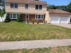 Perfect for an Expanded Family .So much Potential for this 3026 sq. ft. of living space Colonial. 4 /5 bedrooms, 3.5 baths, Full Finished Basement, 2 car garage in the Village of Lake Grove. Large Den/Family Room Oak Floors , Anderson Windows Throughout. Only 10 minutes from Stony Brook College and Close to Nature Preserve Park for Trails To Enjoy.