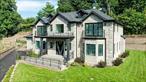 Stunning New Construction boasting 5000 Sq. Ft. of luxury living plus full finished basement located in Prestigious Saddle Rock Estates! A once-in-a-lifetime opportunity to own this exquisite Colonial on a private cul-de-sac in the heart of Saddle Rock Estates. Flooded with natural light and finished with top-tier craftsmanship, this elegant home welcomes you with a dramatic double-height foyer, leading to a formal living room, formal dining room, state-of-the-art chefâ€™s kitchen, and a sun-drenched family room with floor-to-ceiling doors opening to a beautiful veranda. Main level includes a guest bedroom with full bath and a powder room. Upstairs features a luxurious oversized primary suite with spa-like marble bath and private balcony overlooking lush greenery. Three additional bedrooms each with en-suite baths, plus a convenient laundry room complete the second floor. The fully finished lower level offers a spacious entertainment area, full bath, and second laundry room. This home features an all steel structure, main floor has surround sound and full house central vac system. Prime location close to parks, shopping, recreation, and transportation. A must-see masterpiece!