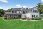 ONE OF A KIND - This beyond beautiful 4-bedroom, wrap around Covered Front Porch Contemporary Colonial at the sought-after The Legends community features over 6, 000 above ground finished square feet, plus an additional 1, 000 finished square ft on the lower level for a total of over 7, 000 finished sq ft. Highlights include: A one of a kind entertainers dream in the conservatory with 12 ft coffered ceiling, audio/video closet, slate floor,  architectural columns, 20 windows for natural light from all four sides and stunning mountain views Breathtaking private backyard with heated salt water pool, hot tub, outdoor kitchen with pizza oven and fireplace. Stunning kitchen with oversize island, granite countertops, Medallion wood cabinetry, custom tile backsplash, recessed and pendent lighting, new stainless appliances, double wall oven, secondary sink, pantry, and breakfast nook. The dining room has a vaulted ceiling, and transom windows; living room with architectural columns. The spacious family room is highlighted by a dramatic two-story stone fireplace. First floor home office. Primary bedroom with 2 walk-in closets, sitting room and tray ceiling; luxurious spa master bath with jetted tub, frameless glass shower, private water closet, double vanity with granite countertop and all walls tiled from floor to ceiling. 3 additional large bedrooms and full hall bath. First floor laundry room with front load washer/dryer and folding station. Lower-level walkout with finished 2nd family room, fireplace, and wine cellar; New roof (2021); Municipal water & sewer; natural gas. Commercial grade security system; 4 zone heat and AC, 3 car garage; Located on over one lush level acre on a cul-de-sac. This is truly a special home you will not find another one like this in The Legends. Trex wrap around front porch, fully irrigated lawn, alarm system, freshly painted. Prime location close to the Taconic State Parkway, major highways. Do not miss the opportunity to own this extraordinary home that combines luxury, functionality, and ultimate privacy.