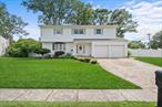 This beautifully updated 5-bedroom, 3.5-bath Colonial offers the perfect blend of timeless charm and modern convenience, located in the Comsewogue School District.Inside, enjoy a bright, open layout featuring a two-year-old kitchen with sleek modern finishes and recessed lighting throughout. The full finished basementâ€”with its own private entranceâ€”offers flexible space ideal for extended family, guests, or a private living area (subject to proper permits).Upstairs, the spacious primary suite features oversized closets and a spa-inspired bath with a natural stone showerâ€”your own personal retreat.Additional highlights include a fire and security alarm system, a one-year-old boiler, and eight-zone sprinklers to keep the grounds lush and green. The roof is just two years old and paired with 1.5-year-old solar panels, offering long-term energy efficiency. The backyard is fully fenced with a brand-new fence along the rear property line, just one month old.The exterior features a private driveway, a two-car garage, and a composite rear deckâ€”perfect for relaxing or entertaining.This is more than a houseâ€”itâ€™s a smart lifestyle in a great location. Donâ€™t miss your chance to make it yours.