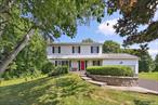 Location, location! Don&rsquo;t miss your chance to see this charming country colonial, perfectly located on a quiet cul-de-sac in central Brewster NY. Incredible location just minutes from highways, shopping plazas, Metro-North stations, and Brewster&rsquo;s desirable school district (elementary, intermediate/middle, and high schools are all right around the corner!). However, convenience does not come at the expense of privacy - this home features a sprawling, level .8 acre yard, including: a stone patio, garden area, and BRAND NEW DRIVEWAY. Stepping inside, you&rsquo;ll immediately appreciate the ideal floor plan - a formal living room with fireplace flowing perfectly into a formal dining room and updated kitchen with granite counters, custom built-in&rsquo;s, and stainless steel appliances (including brand new attached microwave). To complete the main floor, come around to the large family room, which features an attached bath, access to the sizable two car garage, and French doors leading out to a spacious screened in covered deck - incredibly suited to hosting or relaxing to take in the nature views around you. Step upstairs to find 4 bedrooms, all of which feature tall ceilings, generous closet space, and ample size for versatile use. All hardwood floors on the main level and upstairs level have been professionally refinished in the last year! Last but not least - check out the full basement downstairs, which could serve as multi-purpose bonus space, storage space, or could have the potential to finish down the road. BRAND NEW washer and dryer in the basement as well. See the attached survey to view the full scope of this amazing, nearly one acre lot. Opportunity awaits!!