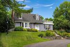 Charming Cape Cod with Stunning Mountain Views and Gardens in Marlboro School district. Nestled on a picturesque .55-acre lot, this charming Cape Cod home is a true retreat, surrounded by vibrant flower gardens and peaceful mountain views. From the moment you arrive, the beauty of the landscape welcomes you inâ€”and it only gets better from there.The private backyard is a serene oasis, perfect for relaxation or entertaining. Enjoy quiet mornings on the covered deck, or take in the panoramic views from the new rooftop balcony, which offers breathtaking vistas of the surrounding mountains.Inside, the main level features a sun-filled eat-in kitchen, formal dining room, and a cozy living room with a fireplace. You&rsquo;ll also find a spacious bedroom and a comfortable family room with a propane fireplace, perfect for gathering with loved ones.Upstairs, a large bedroom is complemented by a cozy den with a reading nook that leads directly to the rooftop balconyâ€”ideal for enjoying your morning coffee with a view.The walk-out basement provides ample storage, a laundry area, and access to the garage, offering both functionality and convenience.Located just minutes from local apple farms, waterfront restaurants, wineries, and shopping, this home is also just 10 minutes to Beaconâ€™s Metro-North Station, making it perfect for commuters or weekenders looking to escape the city.This home is the perfect blend of charm, privacy, and accessibilityâ€”a true Hudson Valley gem.