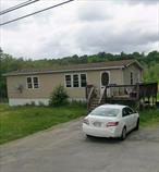 Three houses on one lot! The front house has two units, the top level is 3 bed 2 bath, the bottom level is 2 bed 1 bath and the back house is a stand alone 3 bed 1 bath single family.