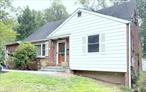 Do NOT wait on this Gem Just Reduced $25, 000 and Seller Still Negotiable !!! 4 Bdrms, 3 Full Baths, Over 2360 Sq Ft Including Partially Finished Basement. Residing on approx 1/2 Acre of manicured property. No Maintenance Vinyl Fencing surrounds entire perimeter of tree lined back yard with Swimming Pool with Heater, ideal for these hot summer days. Brick exterior Cape/Colonial boasts newly paved walkway to enter into 11 capacious rooms in total. Gleaming Hard Wood Flooring on BOTH levels. TWO Bdrms and TWO full Baths on main floor. Spacious Kitchen with Granite Countertops, Stainless Steel Appliances, Sunny Bay Window and over 15 cabinets for storage. This walks out to a spacious sun drenched Patio just steps away to the pool. Other amenities include Central A/C System, Formal Dining Room, Living Room w/wood burning stove, w/vaulted beamed ceilings. Plus a Family Room on 1st level too. Upstairs boasts 2 Bdrms and Full Bathroom too. The Beauty of this Home continues with the Hot Water Htr only 4 yrs new, Furnace only 2 yrs new, Washer only 1 yr new. Basement enhanced by office/family room and Work Shop w/200 Amp Service Panel. Storage galore with as 8&rsquo;x10&rsquo; Cast Aluminum Double-Door Shed outside. Bonus: ALL Municipal Utilities. Ideal Location: close to Parks, Clarkstown Schools, Shopping/Gourmet Restaurants and ALL major highways .  At this Even Lower, Below Market Price it will be gone in a flash, waiting can cost you , GO TODAY !!!