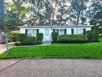 Welcome to this cozy 2-bedroom, 2-full-bath manufactured home located in the desirable 55+ gated community of Foxwood Village. With a little TLC, this home offers great potential to truly make it your own. Step into a spacious living room that flows into the dining area and galley kitchen with an adjacent laundry space. Sliding glass doors lead to a beautiful backyard, featuring a wood deck that overlooks peaceful greenspaceâ€”perfect for relaxing in privacy. Additional highlights include a driveway with carport, storage shed, poured concrete 4â€™ crawl space and sprinkler system. This home is equipped with oil heat, propane cooking, central air conditioning and a newer roof installed in 2021. Foxwood Village offers wonderful amenities including a clubhouse and park area, heated pool, fitness room and a variety of social activities. Monthly fees cover water, septic, trash removal, common area maintenance and snow removal for easy, low-maintenance living.