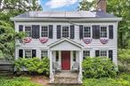 Travel back in time with this enchanting historical home that effortlessly combines old-world charm in a bucolic neighborhood nestled next to a castle. Sitting on a generous 1-acre lot and constructed in 1790, this delightful property is brimming with character around every corner. The main floor boasts a lovely staircase, cozy parlor, welcoming living room with a fireplace, dining room, kitchen with a butler&rsquo;s pantry, au-pair entrance, and more. Upstairs, discover 5 bedrooms, 3 bathrooms, and a back staircase leading down to the au-pair area. Relax on the screened-in porch with access to the flagstone patio, or enjoy the expansive rear yard perfect for gatherings, barbecues, and cozy nights by the fire pit. Balanced between historic elegance, this sprawling property offers original beamed ceilings and hardwood flooring, natural gas, solar panels, and convenience - located near major highways, shopping, schools, and restaurants. This property is a must-see! Come take a trip back in time and explore this charming slice of history.