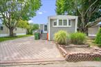 Welcome to 20 Betsy Ross Drive, Bohemia! This beautifully renovated mobile home offers an incredible opportunity to own in the heart of Bohemia at an unbeatable value. Featuring stylish new flooring throughout, a fully updated bathroom, two cozy bedrooms, and a renovated kitchen that flows seamlessly into a separate dining area and spacious living room. Enjoy outdoor living with a generous backyard, a side yard complete with a large storage shed, and your own private driveway. Why rent when you can own? Located in the desirable Sachem School District, this home is ready for you to move in and make it your own!