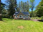 Adorable cottage in Cochecton on 8+ acres is ready for the next chapter. Set privately on a dead end road this 2+ bedroom charmer offers wood floors and original details. Cozy interior with updated kitchen, open plan living/ dining, additional room for office and 2 bedrooms and bath upstairs. Mudroom leads to open deck for outdoor entertaining. This is the only home on this little country dead-end road. Lovely property is open and wooded with mature trees and walking trails. Gather around the firepit with family and friends, enjoy a BBQ on the deck, head over to Bethel Woods (10 minute drive) for world class entertainment or stroll through the quaint river towns on a lazy summer day. So much to do only minutes away: Restaurants, breweries, famers&rsquo; markets, area lakes and the Delaware River for rafting adventures.