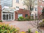 Luxury Doorman elevator building with gym and garage.2 spacious bedrooms, 2.5 baths.Eat in kitchen Hardwood floorsPlenty of closets High ceilingsin unit washer and dryerGreat location- close to LIRR train, buses, and all shops