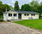 Come enjoy the pleasure of living in this beautifully refreshed and upgraded 8 room, 2.5 bath ranch with open floorplan situated on .48 lovely acres with a shed, large private backyard, fire pit and 3 tiered deck to bb-que, relax, entertain, play, and commune with nature in this Ihighly sought after Arcadia Hills subdivision in Goshen. It features an elegant stucco front, a designer kitchen with Cherrywood cabinetry, granite counters, ss appliances, white wood shiplap ceilings & picture windows & gleaming hardwood floors in dining rm and living room with wood stove.There is a spacious primary bedroom with hardwood floors and 1/2 bath w new barn style door, 2 other bedrooms and full bath with ceramic tile backsplash in tub and tiled floors all on the main level for the ease of living.The 1000 sf lower level (permits were submitted pending approval from town for c of o ) has an expansive L shaped family room with hardwood floors , sliders to back yard and great gas fireplace regulated by thermostat that provides heat, a den/ office/ bonus room w hardwood floors , a huge. room size walk in closet, and wonderful full bath w whirlpool & separate shower for possible in-law use. Improvements include 2018 new roof, gutters, double glazed windows, upgraded electric, 6 car brick paver driveway, extra insulation downstairs & more and has municipal water, sewer and gas. It has a great neighborhood setting & location close to Route 17/ I 86 & bus to commute, restaurants, shopping in Goshen and Chester, parks, trails, golf Legoland & much more. 1000 sq ft of livable space in the basement has final approval. C of O has been issued. Come see for yourself.
