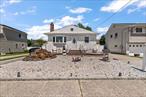 Welcome to this spacious split-level Ranch in the heart of Lighthouse Point in Lindenhurst, just minutes from the water!! This thoughtfully designed home offers an open-concept main level with a stylish updated kitchen, formal dining room with fireplace, and seamless flowâ€”perfect for entertaining. Upstairs, youâ€™ll find three generously sized bedrooms and a full bath, while the lower level features a second living area, spa-like bathroom with Jacuzzi tub, and a sunroom drenched in natural light. Step outside to your private backyard oasis with a deck, above-ground pool, and plenty of space to relax or host. Extras include a 3-car driveway and a prime location near parks, dining, highways, and the marina. A perfect blend of comfort and convenienceâ€”donâ€™t miss it! Solar panels owned and transferable