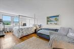 Impeccably Renovated 2-Bedroom with Unmatched Hudson River ViewsStep into this tastefully renovated 2-bedroom, 1-bath cooperative residence and experience the perfect blend of modern style living. Perched on the sixth floor, Apartment 6F offers breathtaking, unobstructed views of the Hudson River from your own private terrace, a tranquil setting to enjoy morning coffee or sunset evenings.This move-in-ready home has been fully updated to meet contemporary tastes. The spacious kitchen features sleek quartz countertops, updated cabinetry, stainless steel appliances, and elegant fixtures, making meal prep a pleasure. The newly refinished hardwood floors flow seamlessly throughout the spacious, light-filled layout. Freshly painted walls and ample natural light enhance the clean, airy atmosphere throughout the apartment.Both bedrooms are generously sized with ample closet space and river-view exposures, offering peaceful retreats. Set in the sought-after cooperative, residents enjoy amenities such as a live-in superintendent, elevator, laundry facilities, private storage (with a waitlist), and on-site parking (also with a waitlist). Conveniently located just minutes from Glenwood Metro-North Station, downtown Yonkers, Untermyer Gardens, and the Hudson River Museum.This is a rare opportunity to own a renovated home with exceptional views.Schedule your private showing today and discover your oasis on the Hudson.