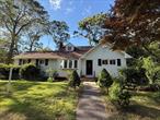A beautifully renovated Cape Cod style offering modern comfort, spacious living, and exceptional value. This 4 bedroom, 2 bath gem sits on a large corner lot and has been thoughtfully update throughout. Step into a sun drenched open concept living room area that flows seamlessly into the stunning eat in kitchen featuring granite countertops and stainless steel appliances. This house has too much to list, come see it for yourself.