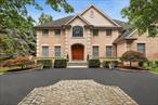 Set down a long, elegant driveway in the prestigious Old Brookville estate area, 184 High Farms Road invites you into a world where timeless architecture meets modern luxury. This stately brick Colonial blends the grace of classic design with the ease of todayâ€™s comforts â€” from its beautifully renovated kitchen and spa inspired baths to its custom millwork, gleaming hardwood floors, and effortless flow. Step through the elegant entry foyer and youâ€™re greeted by formal living and dining rooms perfect for memorable gatherings, while the spacious den/family room with French doors opens to a private backyard oasis. Here, summer days are spent by the sparkling gunite pool, surrounded by lush, manicured gardens that create an atmosphere of total seclusion. The finished lower level transforms into your own private retreat, complete with a custom home theater, cocktail lounge, and generous recreation space for hosting in style. Perfectly located near fine dining, boutique shopping, and world class golf â€” with low taxes, low maintenance, and the highly regarded North Shore School District â€” this move in ready estate offers not just a home, but a lifestyle of elegance, ease, and enduring appeal.