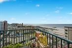 Wake up to sweeping ocean views from every room in this immaculate, turn key two-bedroom, two-bath condo located in the highly sought-after Ocean Grand building in Rockaway Park, Queens. This residence offers the perfect blend of luxury, comfort and oceanfront living.Inside, you&rsquo;ll find a thoughtfully designed layout with an open-concept living and dining area that is warm, inviting and flows seamlessly into an open and airy modern kitchen complete with granite countertops, stainless steel appliances, and custom cabinetry. The spacious primary suite has beautiful direct ocean views and includes a walk-in closet and private en-suite bath. With pocket doors the second bedroom offers flexibility for guests, a home office, or additional living space since it opens up to the living room/dining room. Additional features include in-unit washer/dryer, three separate heat/AC units, hardwood floors, new stainless steel appliances and most importantly your own deeded parking space with an extra storage area. To finish things off, just step out onto your private 15 balcony and take in stunning unobstructed views of the Atlantic Ocean while watching the whale and dolphin pods swim by. Living oceanfront in The Rockaways is truly an amazing experience and one of the best places to live in NYC. The Ocean Grand offers a host of amenities including a doorman/concierge with package room, modern fitness center, computer room, relaxing common areas, a rooftop deck, two elevators, and a secure, well-maintained building with a great live in super. Outside, the surrounding area leaves you with unlimited options of things to do. From the obvious like enjoying the beach, swimming and surfing to over five miles of boardwalk with tons of parks, work out areas, skate parks, pickleball courts, a Par 3 golf course and more. Off the beach, Rockaway has really stepped up its food and entertainment game with several great restaurants within walking distance never mind up and down the rest of the peninsula. Let&rsquo;s talk transportation. Locally, if your not walking or riding your bike there are free shuttles, buses and the A Train to take you up and down the peninsula. Now with accessibility to Brooklyn, the rest of Queens and Manhattan better than ever, you can be whisked off to the city via Express Bus, the A Train or the NYC Ferry that will get you to Wall St in 55 minutes. So don&rsquo;t miss your chance to own a piece of The Rock - perfect as a primary home, weekend getaway, or investment opportunity you&rsquo;ll love everything Rockaway has to offer.