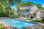 Tucked away on a quiet cul-de-sac just minutes from Westhampton Beach, this inviting 4-bedroom, 2.5-bath home sits on a shy acre with a heated pool and an expansive backyard built for summer living. Inside, enjoy an open, airy kitchen, spacious living room with piano, formal dining room, and a sunlit breakfast area. The fully finished lower level offers great extra space with a ping pong table, rec lounge, and plenty of room to unwind. Additional perks include a one-car garage, laundry room, and easy access to village shops, dining, and the ocean beaches beyond. Available for summer escape.