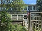 Ocean Beach home for sale in Fire Island, NY â€“ The listing you have been dreaming about. Historic house that words can not describe. Huge and filled with history and charm. Also a full size 50&#215;100 lot to be purchased with the house. The house is super solid but needs some rehab. It has survived every hurricane since 1904. Never leaks!! House alone or the package. This is what people talk about. The white whale. The buried treasure. House 1.24m. House w lot 2.4m. the empty Lot alone is not avail at this time. The Balconies, as this gem is referred to, was built by Captain Ackerly, a famous Long Island builder in 1903. The house was built for the Mayor of New York City, Mayor Gaynor and was the first house built on Wilmot.