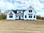 New construction colonial on 3+ acres in the desired Minisink Valley School District. The Palmer II boasts 4 bedrooms, 2.5 baths, 9&rsquo; ceilings, exposed beams & red oak hardwood floors throughout. Warm, inviting fireplace in the cozy living room & custom kitchen with stylish lighting package, tiled back splash and center island. Enormous 1st floor primary bedroom with vaulted ceilings, walk in closet & private bath with soaking tub, tiled shower & double vanities. Covered porch, pressure treated back deck & 2 car garage all included.