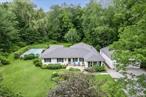 Welcome home to this warm, inviting retreat to relax and bask in the sunshine, lushly adorned gardens, and float in the beautiful in ground pool, or soak in the hot tub, after a long day! Marvelous, one-level home sited on a level, lightly wooded, 2.7 acre parcel with a large, 2 car detached garage, inground pool, and hot tub. Inside, the neutral colors and an abundance of windows, allow for natural light to flow throughout. The granite kitchen with tiled backsplash, stainless steel appliances and double-sided breakfast bar offer an easy flow to the adjoining shared living spaces, for small, cozy gatherings or large get-togethers. The laundry/mudroom provides additional storage to organize necessities. In addition, the pellet stove will help supplement the electric heat during colder months. Summer is upon us; Enjoy the inground pool, and dine with a cool drink under your gazebo! Unwind while you stargaze at night from the hot tub. Privately situated, yet convenient to town, Taconic Parkway, Interstate 84, local recreational parks, community centers. Come see it and fall in love.