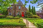 This stately brick-and-stone Tudor sits on a lovely 60 &#215; 100 lot on a peaceful, tree-lined street in Bayside. Inside youâ€™ll find a beautiful entrance, step-down living room with fireplace, dining room, kitchen and large den with four bedrooms,  2.5 baths, a stand-up, walk-up attic and a basement with high ceilings and an attached 2-car garage. Sold strictly â€œAS-IS, â€ it presents a rare chance to reimagine an elegant period home â€” or perhaps start fresh with your own design - in a highly sought-after neighborhood. Enjoy living just moments from parks, schools, shopping and dining along Bell Boulevard with easy access to the Clearview Expressway and other major highways