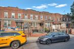 Excellent opportunity to own a Legal 2-family Brick Row house in the prime area of Woodside! Situated at the corner of Broadway and BQE, this property features a legal walkout basement with 2 separate entrances, 1 bed, 1 bath, living room, and a kitchen, and a 1st + 2nd floor duplex unit with 3 bed, 1 bath over 2 bed, 1 bath,  living, dining, kitchen, a common driveway, a 1 car garage, and a backyard. Just a 3-minute walk to the 65th Street Subway Station (E, F, M, R), Buses, Shops, Parks, Playground, Restaurants, PS 152 School, and all other community amenities. This property is not only a comfortable home but also a potential income-generating investment. It&rsquo;s a great addition to any investor&rsquo;s portfolio or a significant purchase for end users, offering both a convenient living location and a promising financial return. DON&rsquo;T MISS OUT!