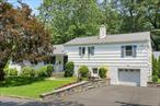 Discover this delightful home nestled in the heart of Scarsdale, where comfort meets convenience. Offering 3 bedrooms and 2 baths, this residence is the perfect match for homebuyers seeking a welcoming community with an easy commute. Seamlessly blending charming details with modern updates, this home is ready to accommodate your lifestyle needs. The renovated, eat-in kitchen is perfect for the culinary enthusiast. Equipped with ample storage and counter space, meal preparation will be a joy rather than a chore. The kitchen opens to a flagstone terrace, ideal for morning coffees or evening gatherings, extending the living space into a serene outdoor seating area. The home&rsquo;s lower level offers a large Family Room, laundry and access to the attached garage with additional bonus space, giving you the flexibility to create a home office, gym, or playroom. Each room in the home boasts inviting warmth, ensuring you&rsquo;ll enjoy coming home at the end of each day. Located within walking distance to Greenacres Elementary, Metro North train, shopping, and a variety of dining options, the location offers something for everyone. Whether you&rsquo;re commuting to work or heading out for a night on the town, youâ€™ll find getting around a breeze. This home not only serves as a comfortable sanctuary but also as a smart investment within a vibrant community known for its quality of living. Don&rsquo;t miss out on the chance to make this your new home!