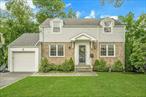 This beautiful and spacious 3/4 bedroom turn-key sun-drenched Colonial in sought-after neighborhood in Scarsdale P.O. with Eastchester schools boasts an effortless open layout perfect for entertaining. Off the wide entry of the formal, gorgeous dining room, step right into this stunning chefâ€™s kitchen that dazzles with all granite countertops including the large 9-ft island, lovely pendant lighting, Wolf/Sub-Zero Stainless Steel appliances, and custom bench seating with deep storage. This all seamlessly opens to a bright family room with a mounted TV above the marble fireplace, and built-ins for storage. Enjoy looking at the large, scenic yard through the new Anderson glass sliding doors or sitting on the wraparound oversized Trex deck with dual staircases. Finishing out the first floor is a formal living room and renovated powder room with radiant floors and newly remodeled stairs sit next to a created coat closet. Upstairs, the luxurious and HUGE primary suite features 2 expansive custom-designed closets that includes a large walk in and a spa like bath that offers radiant heat floors, double vanities, separate water closet and has a massage jet shower and rain head all controlled by an electronic control panel â€“ all Kohler. Two additional family-sized bedrooms also offer custom-designed closets, recessed lighting and beautiful moldings. The created laundry room converted from the 4th bedroom completes the second floor. The finished full lower level is substantial with 3 rooms: a large playroom with a separate door for yard access, a flex room with a wet bar with beverage and wine refrigerators, and a large pantry with barn doors and ample storage space underneath the garage. In addition, there is an elegant renovated full bath with gold detailing. Also, many upgrades including but certainly not least Control4 home automation, blown-in insulation, Hunter Douglas custom blinds throughout, Nest thermostats/smoke detectors, built in speakers, central vac, 2 zone central heat/air, recessed lighting, custom molding, security cameras, app-controlled alarm system, lawn sprinkler system, gorgeous hardwood floors including new 3 1/2 inch white oak on first floor. Lake Isle membership is available upon purchase, which includes an 18-hole championship golf course, year-round tennis, pickle ball, five swimming pools, restaurant and catering hall. Low taxes of approximately $26, 000 without STAR program. This move-in ready home is a rare find in this prime location! 100 Clarence Road is a MUST see to believe all it has to offer!
