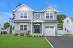 Welcome to your Dream Home!This brand new, Energy Star, custom built 2800 sq. ft. colonial is located in the desirable Dogwood section of West Hempstead on an oversized 6490 sqft lot. Close to shopping and dining, steps from Rath Park Pool. No expense was spared in the build of this home with much attention to detail. There are Anderson Windows, 4 oak floors, LED high hat lighting, crown moldings and wainscot throughout. The home is equipped with a video/alarm system. There is a complete lawn irrigation system and all new professional landscaping.The main floor has an open concept floor plan with 9&rsquo; ceilings, large kitchen/great room with gas fireplace and sliding doors out to a large backyard with paver patio and PVC fencing. The custom, chef&rsquo;s kitchen has quartz countertops and Thermador appliances, including a 36 gas range. Right off of the kitchen is a formal dining room with tray ceiling and formal living room. There is a full bath down the hall. The second floor features a primary suite with tray ceiling, large walk-in closet with custom cabinetry, a private bath with luxurious soaking tub and shower. There are 3 additional spacious bedrooms with ample closets and an additional full bathroom in the hall. There is a laundry closet on the second floor right outside the primary suite. The attached oversized garage has a power opener. The basement has 8&rsquo; ceilings with a walk out entrance. 200 amp electric, 2 zone gas, hydronic heat and central air conditioning. There is a pull-down staircase to the large attic with plywood flooring for storage.Not all new construction is the same! This builder has built well over 100 quality homes in the area over many years and it shows. You must see it in person to appreciate the craftmanship.