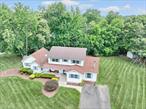 Welcome to 7 Twin Peg Drive â€“ A Rare Find in the Heart of New City!This spacious 3, 044 sq ft Colonial offers a true extended family setup on a beautifully landscaped 0.52-acre lot. Thoughtfully designed to accommodate multi-generational living, this home features a main residence with 4 bedrooms and 3 full baths plus a fully independent first-level apartment with its own private entrance. The apartment includes a large eat-in kitchen, a bright and airy living room, an oversized bedroom with a huge walk-in closet, and its own full-sized laundry room â€” ideal for in-laws or guests. It has been freshly painted throughout and features all new vinyl flooring, giving it a clean, move-in-ready feel. There is also flexibility to convert a second bedroom for the apartment, if desired, while still maintaining three bedrooms upstairs in the main home. The main homeâ€™s first floor offers a spacious kitchen, formal dining room, and a large great room with a fantastic wood stove, perfect for cozy nights and energy-efficient warmth. You&rsquo;ll also find a main-level bedroom and a separate office, ideal for remote work or guest space. Upstairs features three generously sized bedrooms and two full baths, including a spacious primary suite with a huge walk-in closet and a beautiful en-suite bath complete with double vanity and oversized shower. All of the hardwood floors throughout the main house have just been beautifully refinished and are absolutely stunning. Outside, enjoy relaxing mornings on the charming rocking chair front porch or entertain in style on the extra-large deck, overlooking the private, level backyard. There&rsquo;s plenty of room to throw a ball, kick a soccer ball, or simply enjoy the outdoors. Located on a quiet closed-end street with no thru traffic, it&rsquo;s perfect for bike rides, walks, or roller skating â€” an ideal setting for peaceful living with space to play. Situated within the highly regarded Clarkstown South High School district and close to the Town of Clarkstownâ€™s parks and community pools, this home offers a rare combination of space, comfort, and flexibility in one of New Cityâ€™s most sought-after neighborhoods.