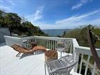 DO NOT DISTURB OCCUPANT-Relaxation At Its Best In This Private, Beach house Oasis. Boasting Triple Sliders To Your Entertainers Deck W/ Unobstructed Views Of Long Island Sound! This Home Offers 3 Br&rsquo;s Plus Loft As 4th Sleeping Quarters & Comes Tastefully Furnished. The Family Rm is Open To Dining Area W/ Vaulted Ceilings, Kitchen has Updated Counter tops & Young Stainless Appliances, Outdoor Privacy Fence, Additional Lower Deck, Gas BBQ, Separate Sink & Grill Station along with Outdoor shower with Double Shower heads, & Wifi Capable Speakers are just some of this Unique Homes Features. Numerous Updates throughout including Brand New Roof, & Upgraded Septic System. Your Own Laundry Shed, & Parking for 2-3 Cars. To Top it all off You have your own Staircase to go down to the Beach Access. MUST SEE-NOTE COMMUNITY IS OPEN ONLY APRIL 15-OCTOBER 15. LAND IS LEASED AT $10, 246.43 Year Plus Taxes. CASH SALES ONLY! Additional information: Appearance:Mint, Interior Features:Lr/Dr