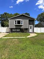 This is a In LIne Hi Ranch SOLD AS IS CONDITION ONLY No Kitchen, Cabinets only Appliances, Needs Kitchen Cabinets and Sink , Design Your Own, House was Upper Level Completely Gutted and Remoldel , New Floors , New Interior Doors , New Electric, New Bathroom Upstairs needs to be Completed.Hardwood Floors Through Out Home, Lower Level Needs Over Haul Large Backyard with Extra Space Gated for Pool