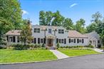 Tucked away on a private road in the Incorporated Village of Laurel Hollow, this newly renovated 1910 Colonial masterfully blends historic charm with modern luxury on 2.2 acres of beautifully landscaped grounds. The exterior showcases Hardi-Board siding, brand-new windows and roof, and classic restored shutters that echo the home&rsquo;s original character while offering lasting durability and curb appeal.The park-like setting features rolling lawns, two koi ponds with a cascading waterfall, a new Bluestone masonry walkway, a covered patio, outdoor bar area, and a fenced yard surrounded by specimen trees and curated plantingsâ€”creating a true virtual arboretum.Inside, a thoughtfully reimagined floor plan highlights a stunning new gourmet kitchen with dual center islands, quartz countertops, and Viking appliances. The gracious living room with fireplace and a library/officeâ€”also with a fireplaceâ€”open to a screened-in porch, offering seamless indoor-outdoor living. A dramatic great room with a soaring cathedral ceiling and a third fireplace sets the stage for both grand entertaining and relaxed everyday living.The first-floor primary suite is a private haven, featuring generous walk-in closets and a spa-like bath with a steam shower. A spacious mudroom, dedicated laundry room, and nearby powder room complete the main level with function and convenience.Upstairs offers three well-appointed bedrooms and two renovated full baths, providing comfort and privacy for family and guests.Enjoy exclusive Laurel Hollow Village beach and mooring rights and the top-ranked Cold Spring Harbor School Districtâ€”making this an extraordinary opportunity to own a piece of Long Island&rsquo;s timeless elegance. GREAT TAXES!