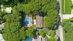 This charming ranch-style home is nestled in the highly desirable Pine Neck Landing community, south of the highway in East Quogue. With access to a private community bay beach and marina with available boat slips, it offers amenity-rich coastal living at its best.Designed for effortless single-level living, the home welcomes you with a cozy sitting room that opens into a sunlit, open-concept great room. A wood-burning fireplace with a mantle sourced from Gone With the Wind, along with original wood beam accents, brings warmth and character to the space.The eat-in kitchenâ€”featuring a two-year-old double ovenâ€”and adjacent dining area are filled with natural light, thanks to three sliding glass doors that open directly to the backyard. Outside, a spacious patio and heated in-ground pool with a brand-new pump offer a private space for entertaining or unwinding.A hallway off the main living space leads to two full bathrooms and three comfortable bedrooms, including a private en-suite.Whether you&rsquo;re looking for a year-round residence or a peaceful Hamptons getaway, this home is a standout opportunity in a prime East Quogue location. (Dining room chandelier & hallway light fixture do not convey with sale)